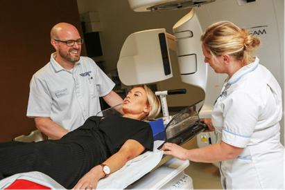 Two Therapeutic Radiographers with a patient
